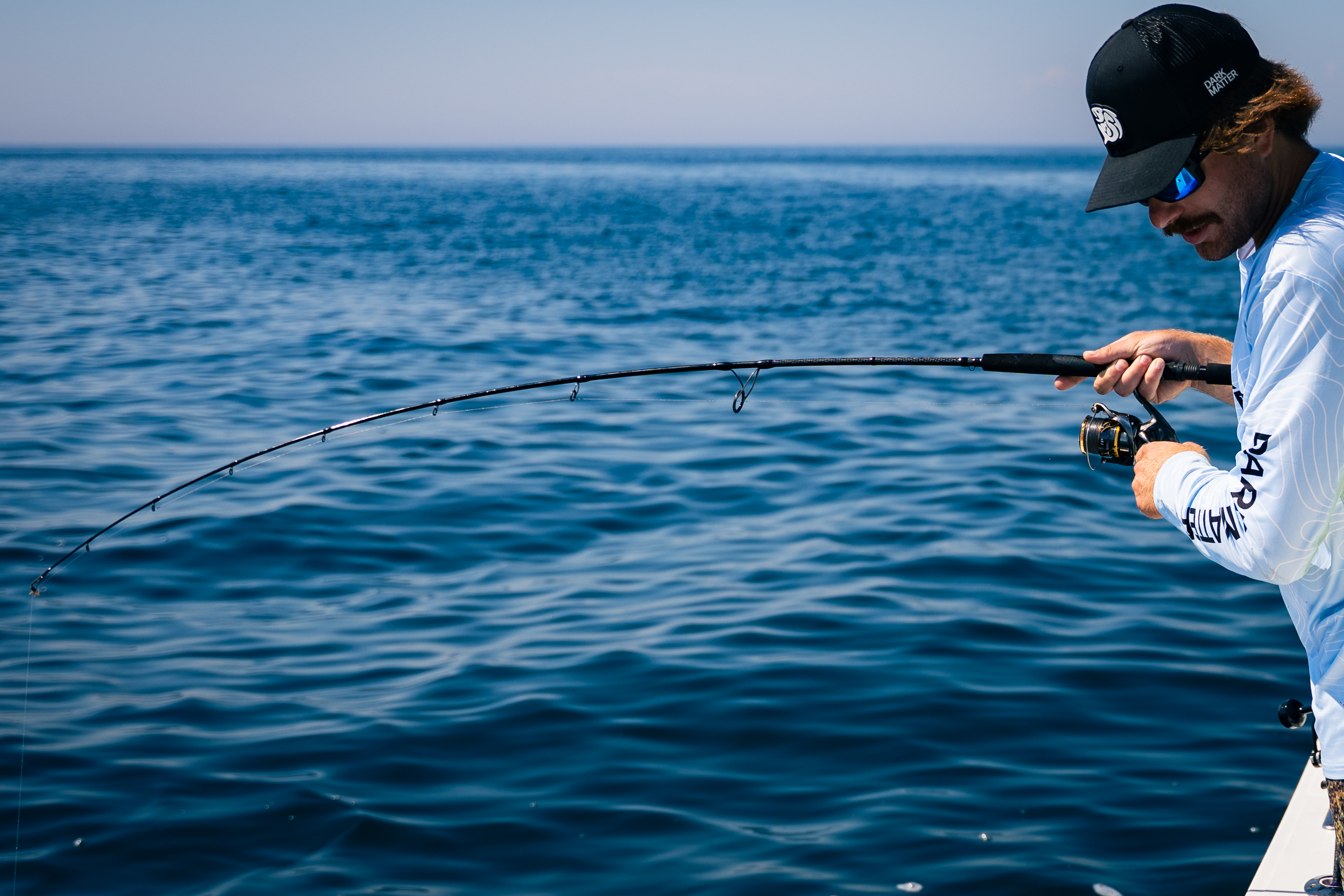 Dark Matter IO Spinning Rods